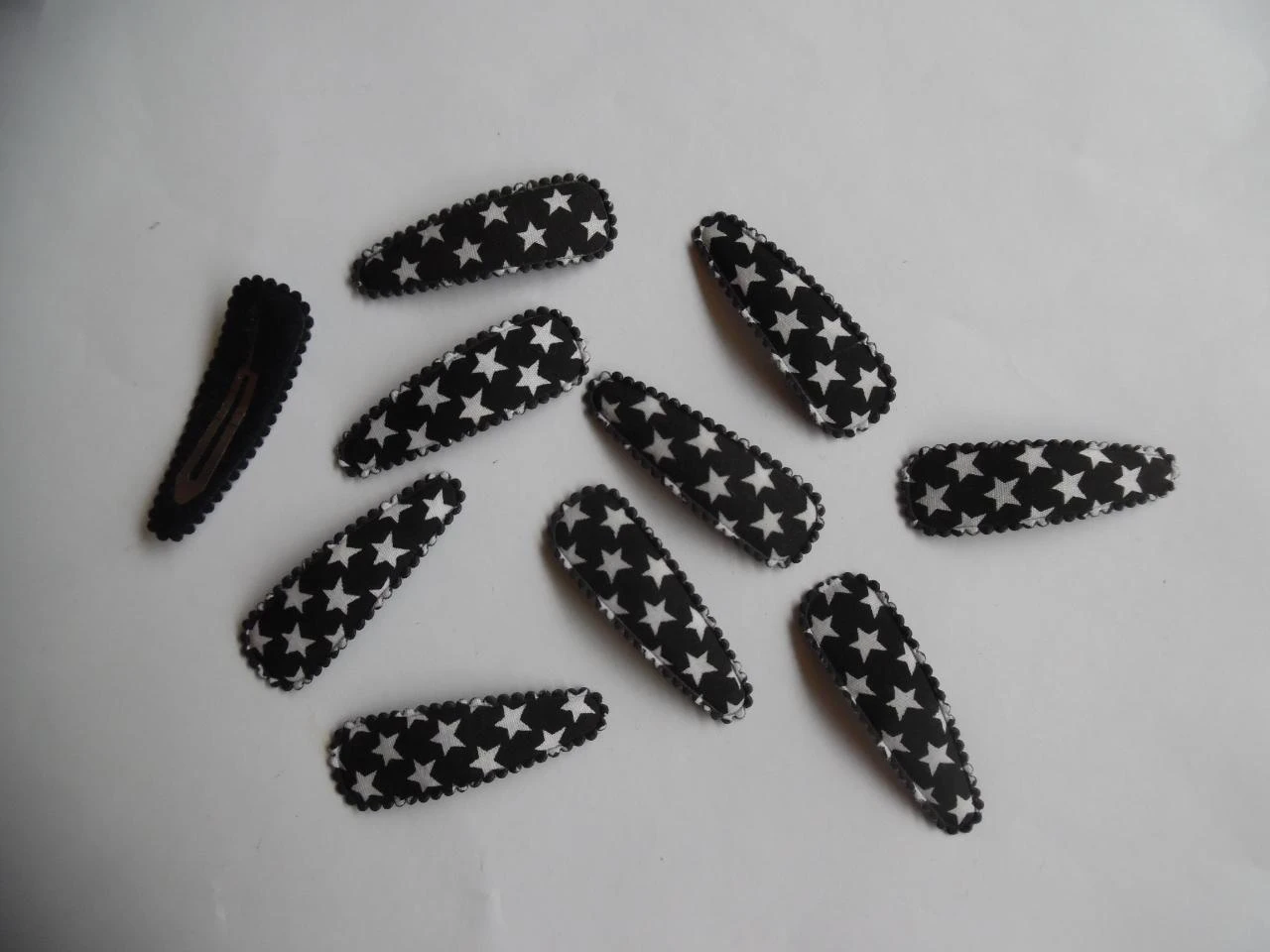 Partij 10 haarspeldjes 5 cm zwart met sterren